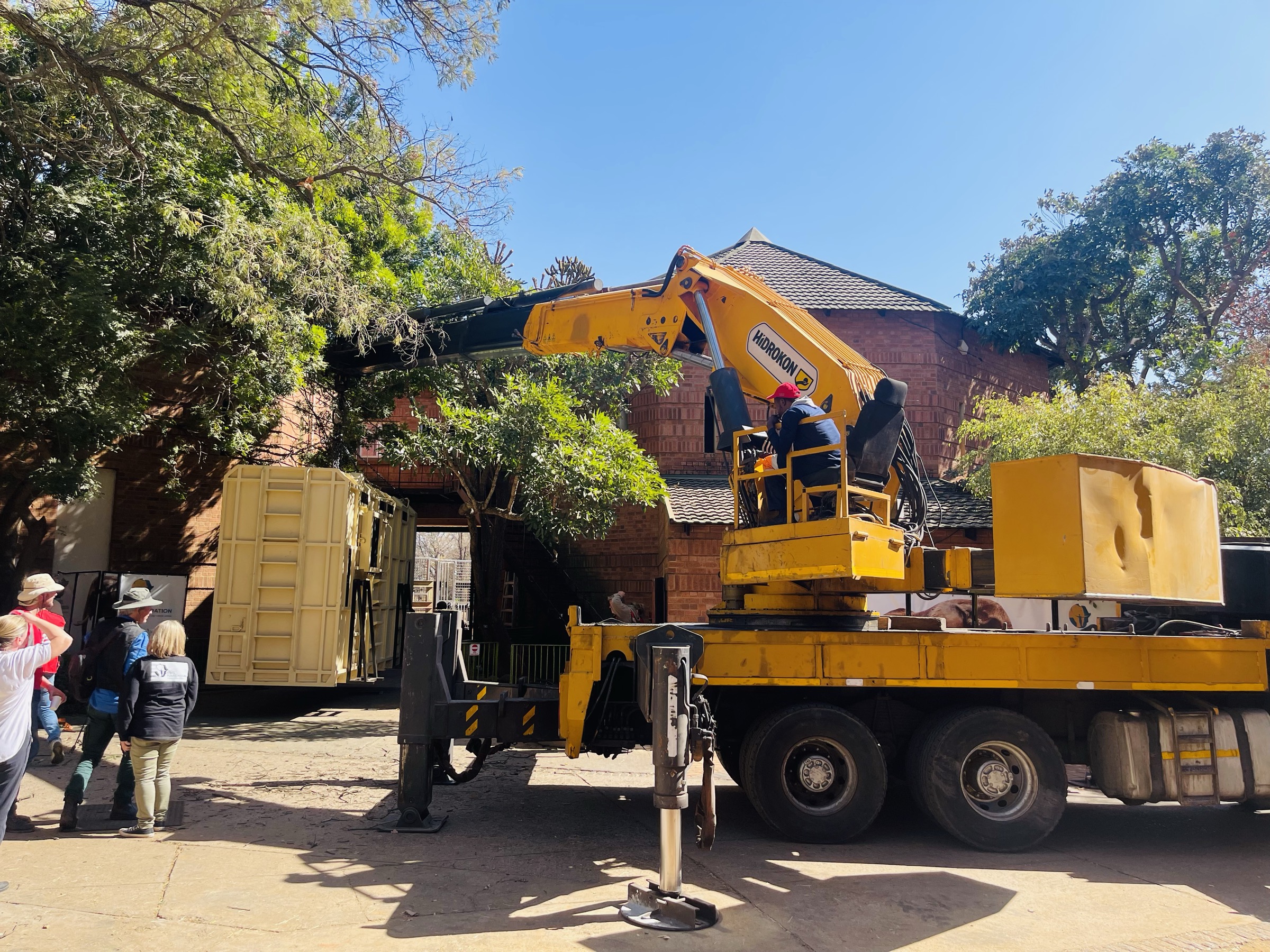 Crane truck unloading an elephant transport container at Pretoria Zoo