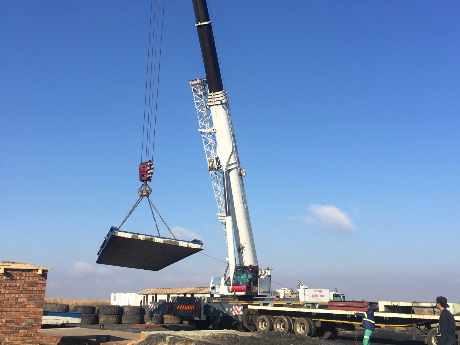 60-ton mobile crane placing a concrete weighbridge slab into position