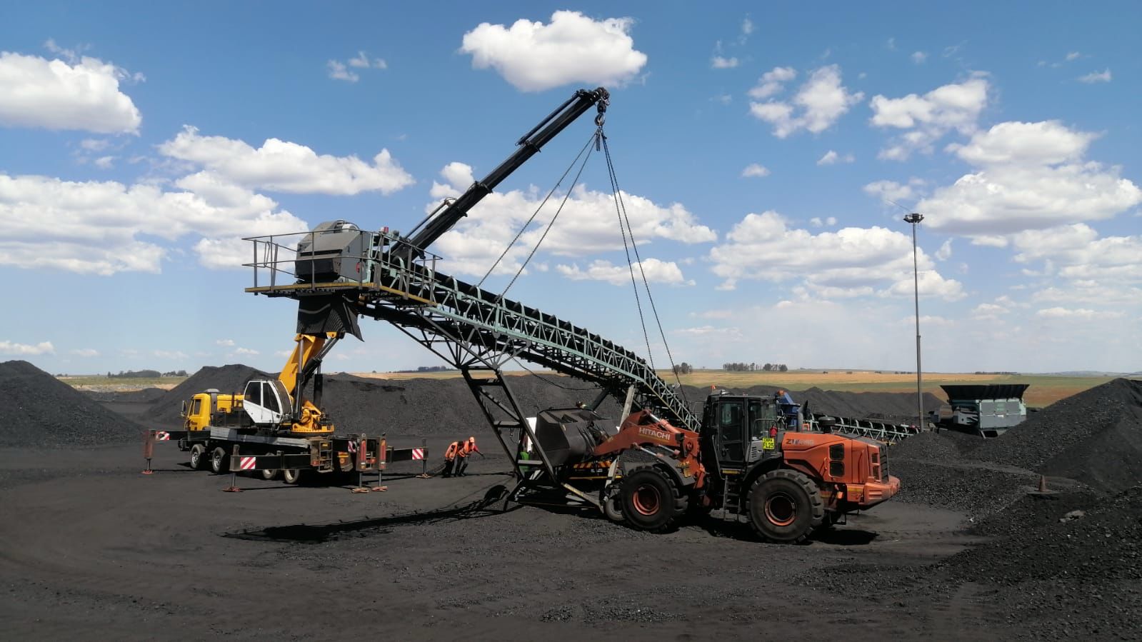 Mobile crane working at a mining operation
